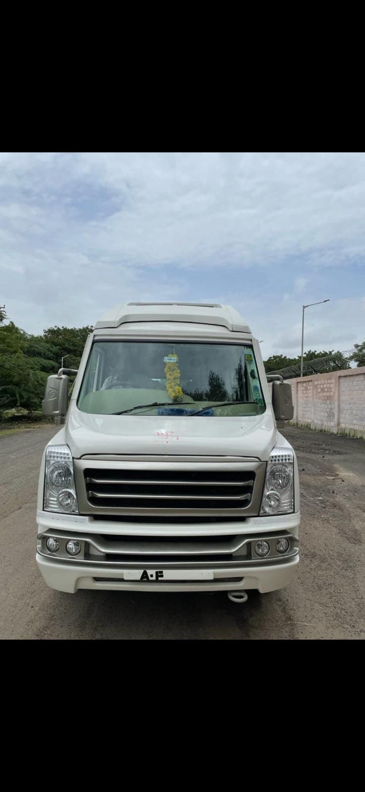 Authentic 12-seater 1x1 Maharaja tempo traveller with pushback recliners